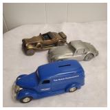 Vintage metal car piggy banks.