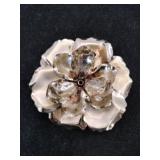Gold tone flower brooch