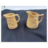 Two beige small pictures 3 inches tall