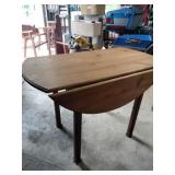 Wooden round drop leaf table 29x 41 round has