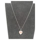 Silver (peace be with you ) l locket and chain.