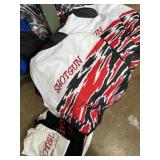 Shotgun western wear coats and T-shirts. One coat
