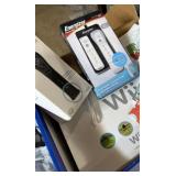 Wii gaming system in  original box with games and