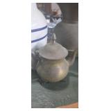 Oriental brass colored teapot