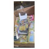 Large assortment of Pokï¿½mon cards with holes