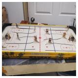 Vintage table top hockey game.