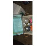 Basket of cleaning supplies with extra basket