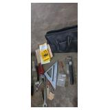 Tool bag with assortment of hand tools