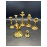 Various brass candlesticks