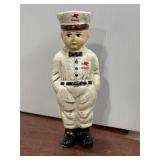 Modern Mobileoil attendant cast iron coin bank,