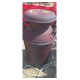 Red painted dairy milk jug