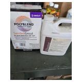 Sanded grout and grout additive