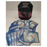 100 + Pokemon cards W/ Tin mixed years