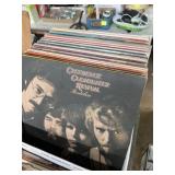 Collection vinyl records, including Creedence