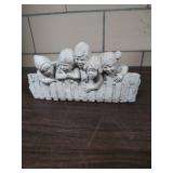 Sculpture of children for shelf.