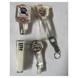 Four small beer taps, including paps blue ribbon,