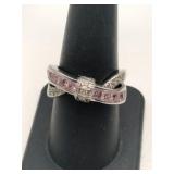 Silver pink /clear criss cross band ring marked