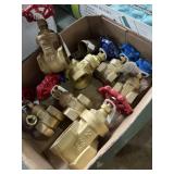 Variety of brass shut off valves ranging from 2