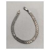 Silver waved chain bracelet marked 925.