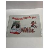 12 in x 17 in metal Mountain Dew sign