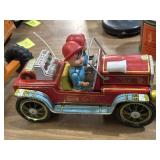 vintage red Fire Chief tin toy car with two