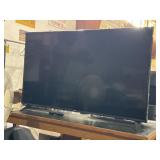 65 inch LG flatscreen TV with Xfinity remote,