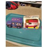 Die cast coin bank and a tin truck