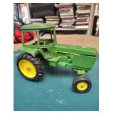 Old steel John Deere tractor ertl made in usa