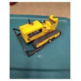 Old steel bulldozer toy