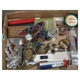 Mix of trinkets, LCR dice game, light catchers,