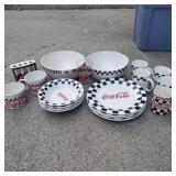 Group of coca cola dishes.