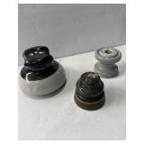 Three ceramic electric insulators