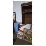 Wooden lighted bookcase coors beer poster wall