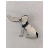 Silver dog brooch marked Sterling.    .210oz