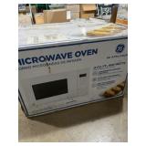 GE 900 W .9 ft.ï¿½ microwave oven new in box