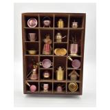 Miniature display with mini decor glued