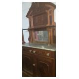 Victorian style marble top buffet with key hole