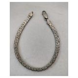 Silver length bracelet marked 925.    .400oz