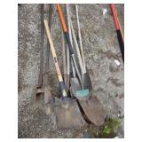 Post hole diggers , pick and shovels