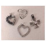 Silver heart  pendants marked 925.   .305oz
