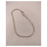 Silver snake bracelet marked 925.    .120oz
