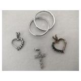 Silver heart cross ring marked 925.    .290oz