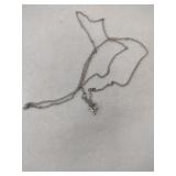 14k white gold chain marked 14k.  .030oz