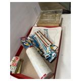 Crafting items, including paintbrushes,