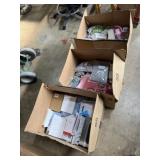 Three boxes completely full of unopened overstock