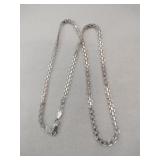 Silver linked chain marked 925.    .285oz