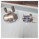2 fishing reels.
