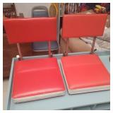 Pair of vintage stadium seats