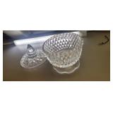 The material of this covered candy dish is clear