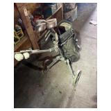Golf clubs and golf bag with play day caddy